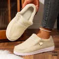 Close-up of fuzzy winter loafers showing 2.5cm platform sole height for extra warmth - Beige