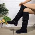 Elegant black slouchy mid-calf boots featuring decorative buckle detail and sturdy low block heel. - 35 / Black