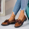 Elegant brown patent leather loafers for women with a bow detail and chunky black platform sole - 36 / Tan