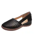 Side view of black women's wedge sandals with hollow-out design and brown rubber sole. - 35 / Black