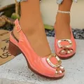 Elegant coral patent leather peep-toe sandals featuring a bold gold buckle and block heel - 36 / Orange Red