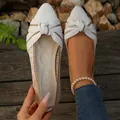 Detail view of stylish knit pointed-toe flats with bow knot and comfortable sole - 36 / White