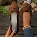 Close-up detail view of stylish brown flyknit pointed-toe flat shoes with an elegant bow knot - 36 / Coffee
