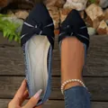 Close-up of stylish navy blue pointed-toe knit flat shoes with a decorative bow knot - Dark Blue