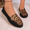 Close-up of leopard print detail and black suede on women's flat loafers. - 35 / Black Leopard