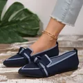 Detailed close-up of navy blue pointed-toe fly-knit flat shoes with decorative bow knot - 36 / Dark Blue