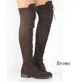 Detailed side view of brown over-the-knee flat boots with elegant front lace-up design - 35 / Brown