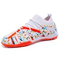 White knit soccer shoes with colorful graffiti patterns and orange turf studs - 36 / White Orange Turf Cleats