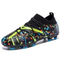 Close-up detail of high-top soccer cleats featuring colorful splatter design and long studs - Black & Yellow Long Cleats