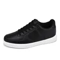 Unisex low-top black faux leather retro sneakers with white soles for casual wear - 36 / Black