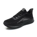 Breathable black flyknit running shoes for men and women featuring a textured sole design - 36 / All Black