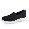 Women's breathable black mesh slip-on sneakers with white sport sole - 35 / Black