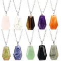 Close-up detail view of ten natural crystal coffin pendant necklaces in various colors - Red Jasper