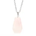 Detailed view of the pink rose quartz coffin pendant with polished facets on a silver chain - Rose Quartz