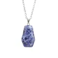 Macro view of blue natural stone coffin pendant with silver chain jewelry detail - Blue Sodalite