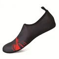 Close-up detail of black elastic mesh swimming shoes featuring a vibrant red flame graphic - 40/41 / Red Flame Pattern (k27)
