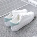 Trendy white leather-style women's sneakers with a minimalist mint green heel accent - 35 / Blue and White Color Block / Blue