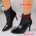 Elegant black pointed-toe stiletto ankle boots featuring an 8cm heel and 12cm shaft height - 36 / Black