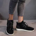 Women's black low-top suede ankle boots with elastic toggle laces and speckled white soles. - 35 / Black