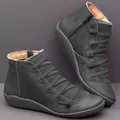 Minimalist grey flat ankle boots for women with side zipper and unique strap detail - 35 / Gray
