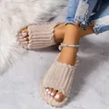 Close-up of beige corduroy slippers with soft plush texture for cozy indoor wear. - 36-37 / Off White