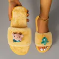 Detail view of yellow fuzzy Christmas slippers with reindeer and tree decorations. - 36-37 / Yellow