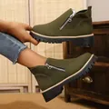 Close-up detail of olive green Martin boots with side zipper and thick lug sole - 36 / Green