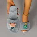 Close-up detail of grey fuzzy Christmas slippers with reindeer and tree decorations. - 36-37 / Gray