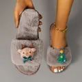 Close-up of grey fuzzy Christmas slippers featuring cute reindeer and tree patterns - 36-37 / Khaki