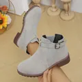 Close-up of grey suede Martin boots with belt buckle and elastic side panels - 35 / Gray
