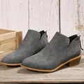 Elegant grey pointed toe ankle boots with low heel and chic side cutout detail for women - Gray