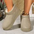 Detailed view of women's winter snow boots with warm velvet lining and slip-on design - 36 / Beige