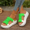 Close-up detail showing vibrant green braided straps on white platform sole sandals - 35 / Green
