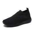 Comfortable black flyknit slip-on walking shoe with breathable mesh and flexible rubber sole. - 35 / Black