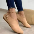 Detail view of beige suede V-cut flats featuring an elegant side buckle closure - 35 / Apricot
