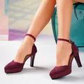 Detailed view of elegant burgundy suede high heels with ankle strap worn by a model - 34 / Burgundy
