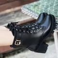 Women's black chunky heel Martin boots with fleece lining and buckle detail. - 35 / Black (Fleece Lined)