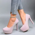 Sparkling pink glitter high heels featuring a thick platform and stiletto heel detail view - Pink