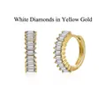 Close-up of elegant gold-finished huggie hoop earrings featuring baguette-cut white zircons - Gold / White