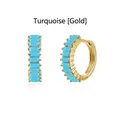 Detailed close-up of gold hoop earrings featuring trapezoid-cut blue turquoise stones. - Gold / Turquoise