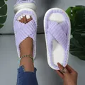 Close-up of lavender fuzzy cross-strap slippers with thick white platform soles - 36-37 / Violet