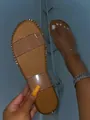 Comfortable flat brown sandals featuring clear double straps and gold metallic stud trim - 36 / Clear