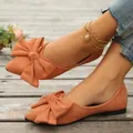 Eleganti scarpe basse a punta con grande fiocco in morbida pelle scamosciata arancione - Arancione