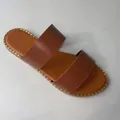 Chic brown flat sandals for women featuring two wide straps and gold stud trim detailing - Brown
