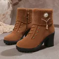 Detailed view of brown high-heel boots with glitter knit collar and pearl brooch - 35 / Dark Brown 05