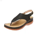 Women's black wedge thong sandals featuring an elegant embroidered strap design - 35 / Black