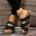 Detail view of black platform wedge sandals with woven straps and cross strap detail - 35 / Crossover Woven Style / Black