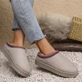 Close-up of women's beige low-top snow boots with cozy fleece lining and embroidered trim - 36 / Off White