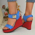 Detailed view of women's peep toe wedge sandals featuring blue and red color block design - 35 / Blue and Red Contrast