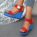 Detailed view of red and blue platform wedge sandals with peep toe and ankle strap. - 35 / Red Blue